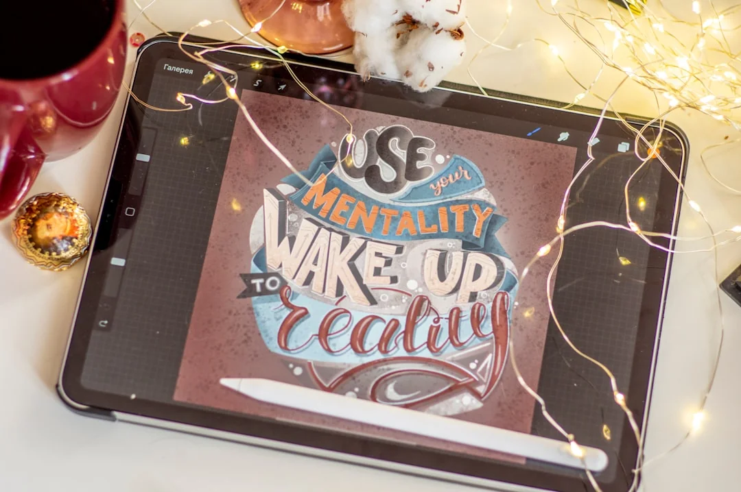 A person using a laptop to browse stock photo websites. Freelancing work in a cozy setting.